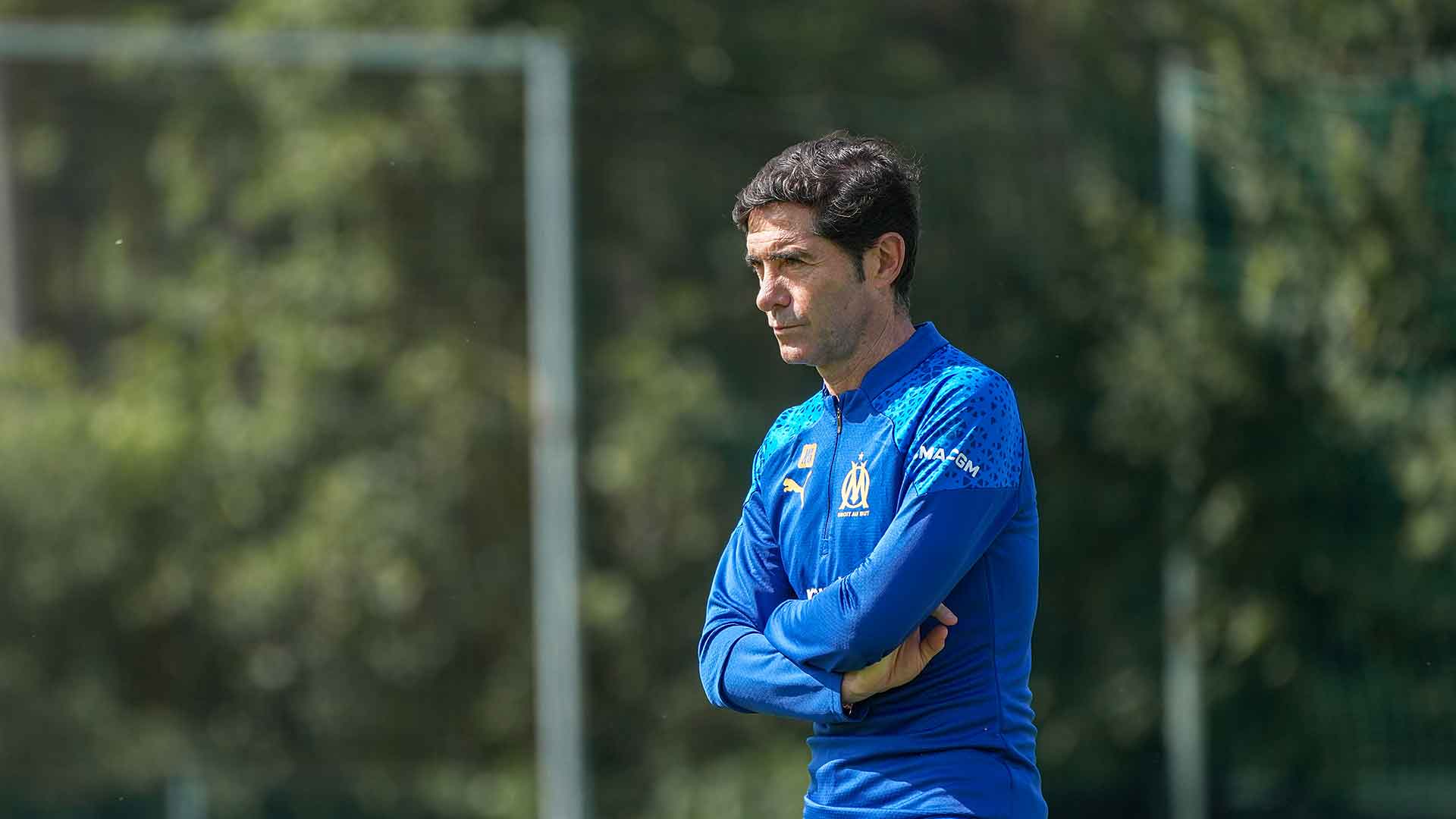Marcelino watching a practice on the football pitch