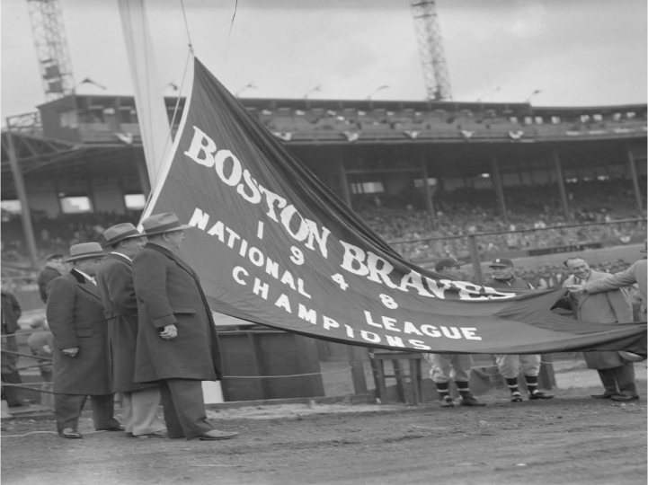 black-and-white; flag stating "Boston Braves, 1948, National League Champions" being raised at Braves Stadium