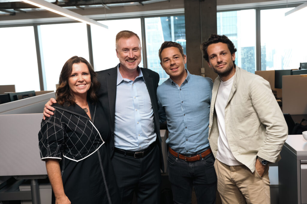 McCourt Global team members in the NYC office