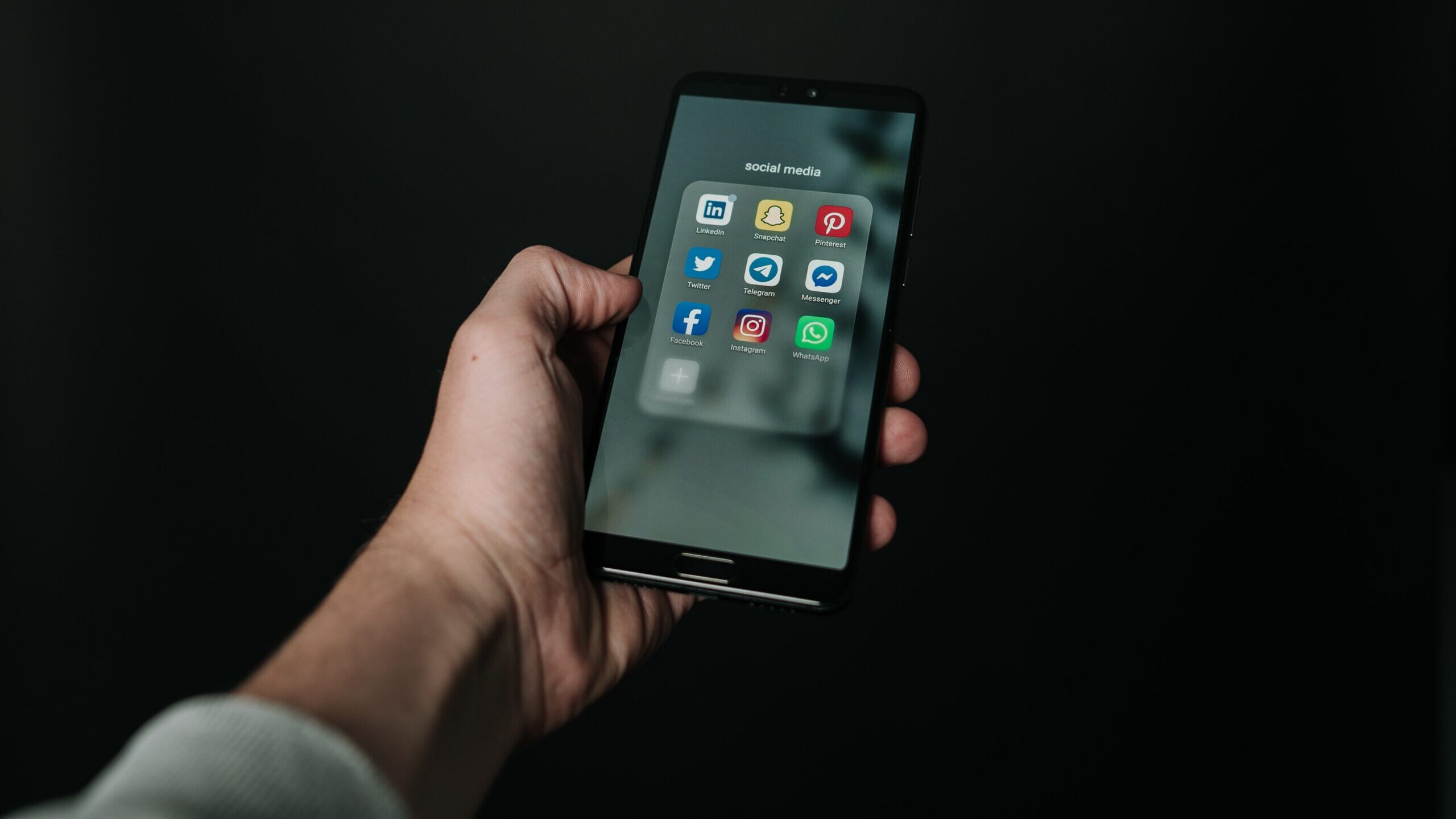 Phone screen showing social media apps